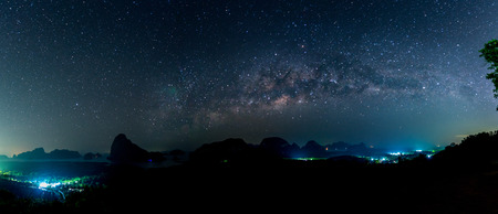 The Milky Way over moutain and ocean phanga thailandの写真素材