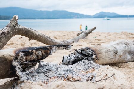 After Bonfire on the sand beachの写真素材