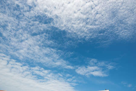 Clouds in the blue sky at sunny dayの写真素材