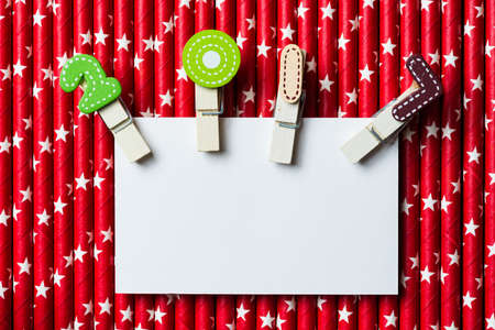 White blank card with clip 2017 on  red white star  straw backgroundの写真素材