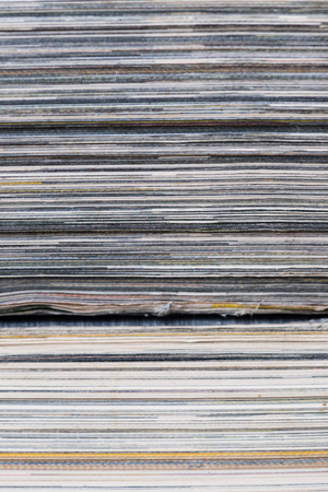 stack of colorful magazines or documents - paper edges backgroundの写真素材