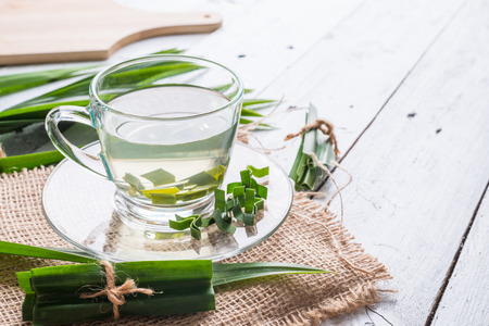 Fresh Fragrant Pandan Tea and leaves on white wood backgroundの写真素材