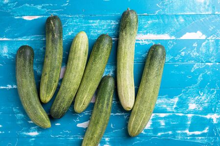 Fresh cucumbers on wood table. Green cucumber from Thailand.の写真素材