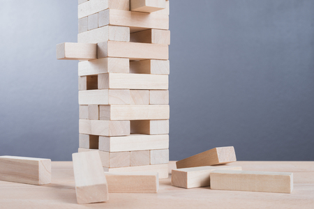 Close up blocks wood game on wooden table background. With copy space for text or design conceptの写真素材