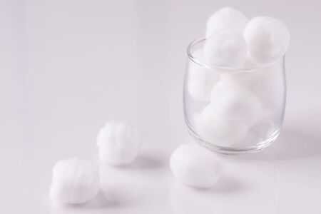 Cotton wool on white background with copy spaceの写真素材