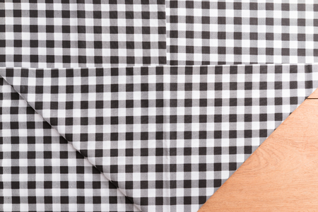 Abstract tablecloths on the wooden table background