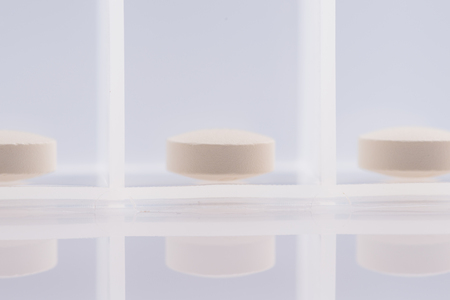 Pharmacy theme,  white medicine tablets antibiotic pills.の写真素材