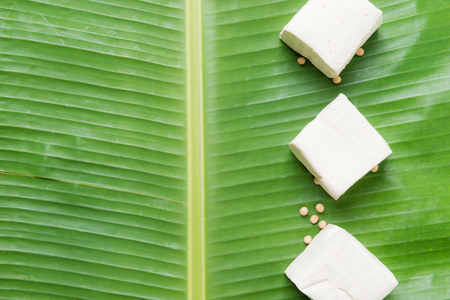 White tofu are a good source of protein on wood backgroundの写真素材