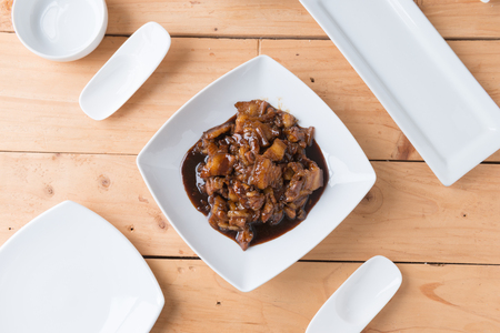 Sweet Pork Condiment (Thai name is muu waan) Thai streaky pork menu with coconut or palm sugar and black sauce.の写真素材