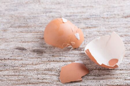 Peeled boiled egg on wooden backgroundの写真素材