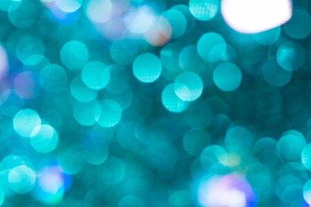 Colorful glitter abstract background with bokeh defocused lights christmasの写真素材