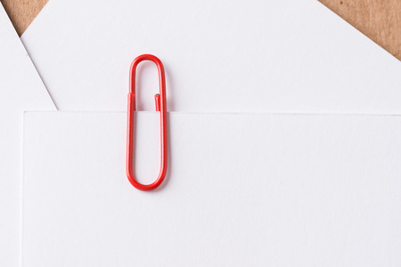 Paper clip with stack of  blank white business cardの写真素材