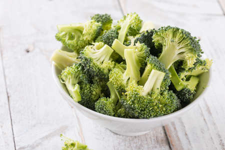 Fresh Broccoli  on white wooden table background