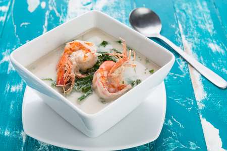 Shrimp and Paco fern (Diplazium esculentum) boil with coconut milk soup phuket thai style healthy foodの写真素材
