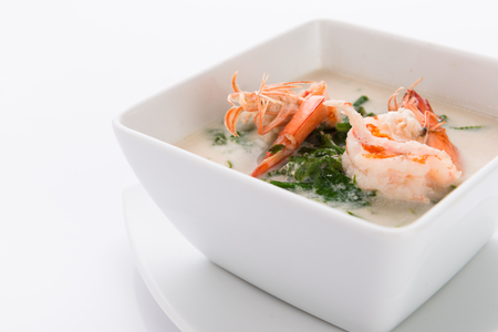 Shrimp and Paco fern (Diplazium esculentum) boil with coconut milk soup phuket thai style healthy foodの写真素材