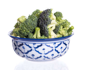 Fresh broccoli isolated on white backgroundの写真素材