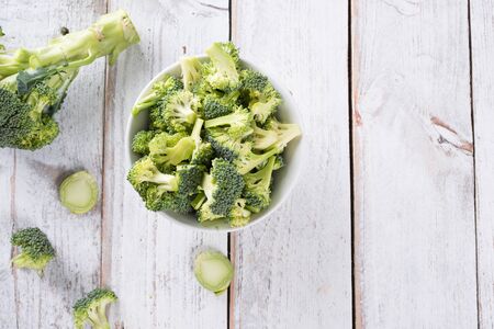 Fresh Broccoli  on white wooden table backgroundの写真素材