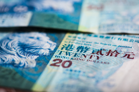 Pile of many Hong Kong Dollar banknotes as money background.の写真素材