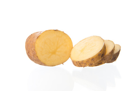 Raw potato food . Fresh potato Sliced isolated on white backgroundの写真素材