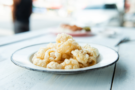 Crispy Pork Skin , Pork rinds also known as chicharon or chicharrones, deep fried pork skinの写真素材