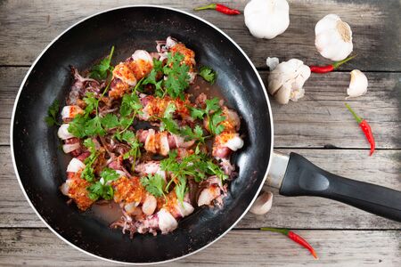 Steam Squid with Spicy Chili and Lemon Sauce.  Pla Muk Nung Manow.の写真素材