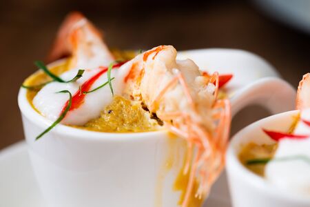 Steamed Seafood Curry Cakes (Haw Mok Thalay) with coconut cream and Prawn.の写真素材