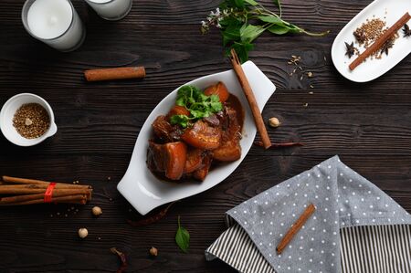 Pa-Lo Thai Braised Pork Belly , Phuket Pork Stew in white bowl
