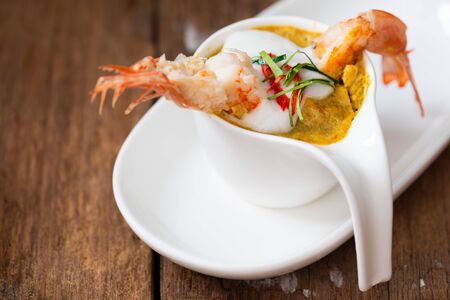Steamed Seafood Curry Cakes (Haw Mok Thalay) with coconut cream and Prawn.の写真素材