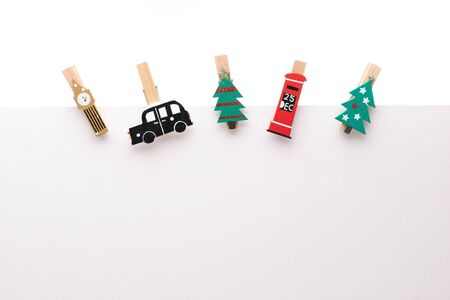 Blank paper sheet with Christmas theme paper wooden clipの写真素材