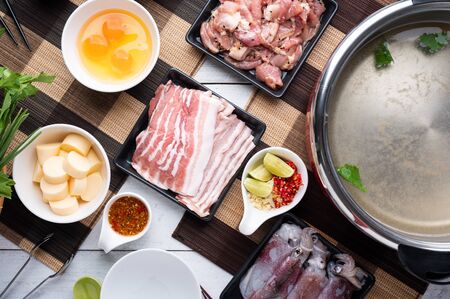 Sukiyaki . Preparation of raw materials,beef,egg ,tofu,vegetable and mung bean noodle  for sukiyaki using hot pots. Asian Foodの写真素材