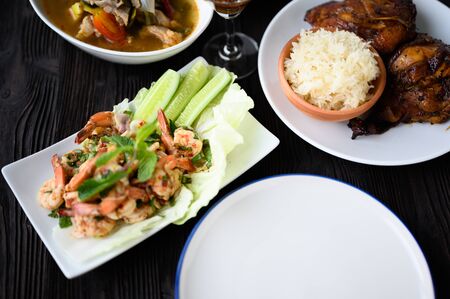 Thai food - spicy Shrimp salad with garlic and basil , asian food