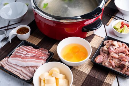 Sukiyaki . Preparation of raw materials,beef,egg ,tofu,vegetable and mung bean noodle  for sukiyaki using hot pots. Asian Foodの写真素材