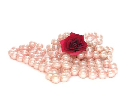 Pink Pearls And Red Rose isolated on whiteの写真素材