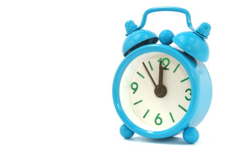 Blue alarm clock on white backgroundの写真素材