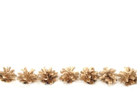 Christmas gold cones border, close up shotの写真素材