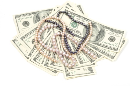 Hundreds of dollars and pearls necklace の写真素材