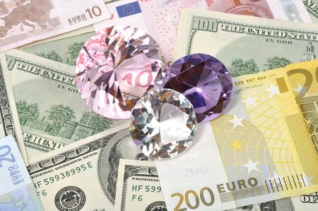 Three Diamonds on euro and  dollars, closeupの写真素材