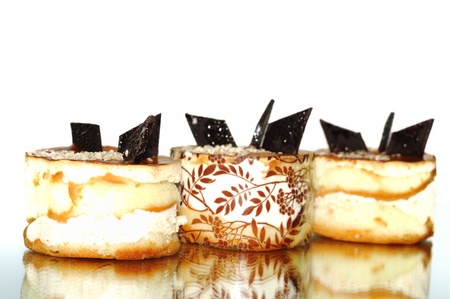 Small cakes with chocolate, close up
