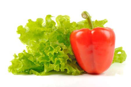 Red pepper with green salad, on a white backgroundの写真素材