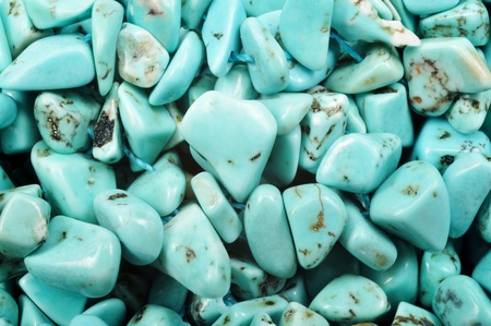 Pierre turquoise gem stone background, closeup