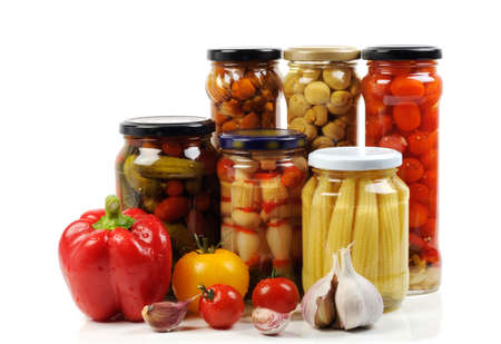 Fresh and pickled vegetables and mushrooms on whiteの写真素材