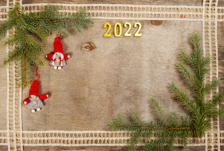 New year concept, on a wooden background, 2022 number on the top, flat lay.の写真素材