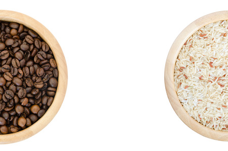 coffee beans in a bowl isolated on white backgroundの写真素材