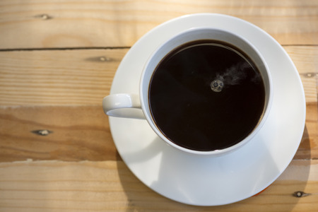 Top view of a cup of coffee and bubble with smokeの写真素材