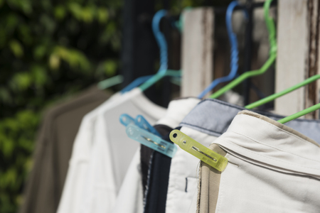 Hang clothes on fence door under the sunの写真素材