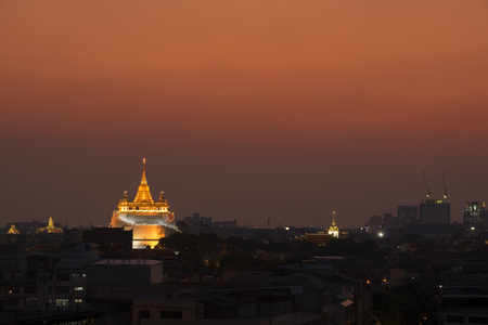Scene of beautiful sky duing twilight of golden mount templeの写真素材