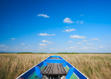 Scene of talae noi on the long tail boat on blue sky and cumulus cloudsの写真素材