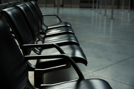 Row of empty seats for passengers in the airportの写真素材