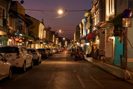 Phuket, Thailand-December 31, 2019: Scene of twilight sky and nightlife at old town with sino-portuguese architecture style buildings at Talang road, Phuket city, Thailand.のeditorial素材