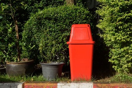 Re garbage bin on the grassの写真素材